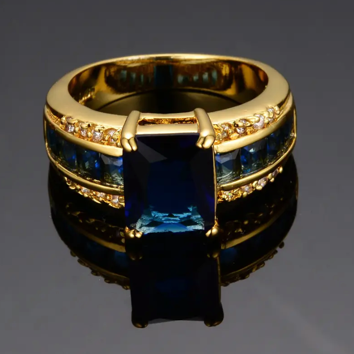 Anel Kassira Safira Dourado